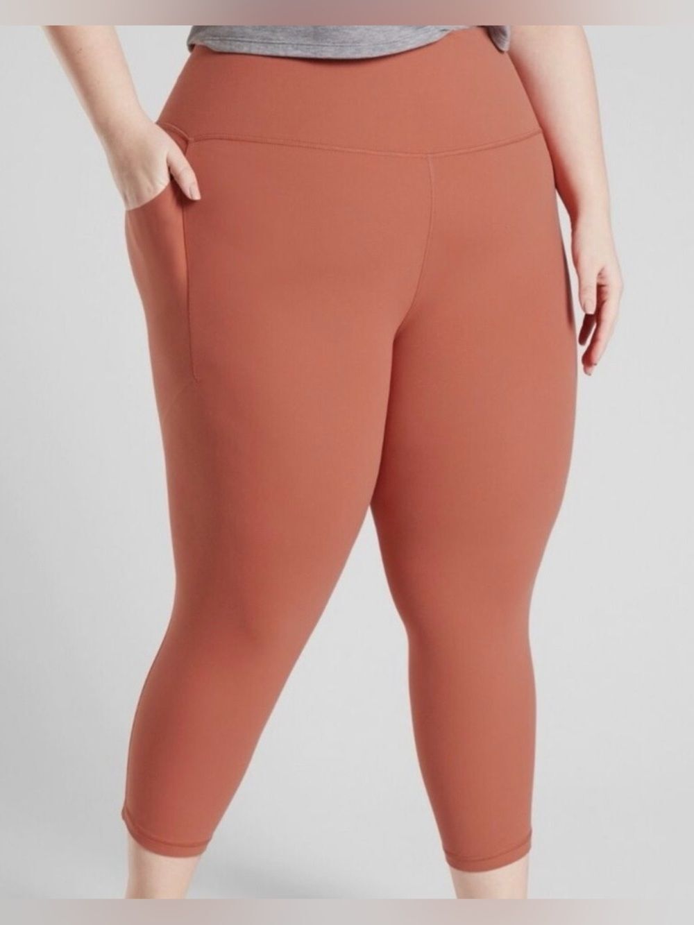 Athleta Burnt Orange Salutation Stash Pocket II Capri Athletic Leggings